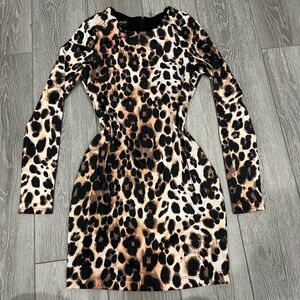 BEBE Leopard Scuba mini dress